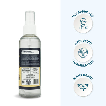 Rear view of the Canni Clean bottle showing composition details alongside icons for Vet Approved, Ayurvedic Formulation, and Plant Based.