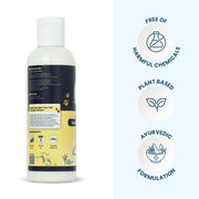 Back view of the sunscreen bottle showing product composition alongside badges for "Free of Harmful Chemicals," "Plant Based," and "Ayurvedic Formulation."
