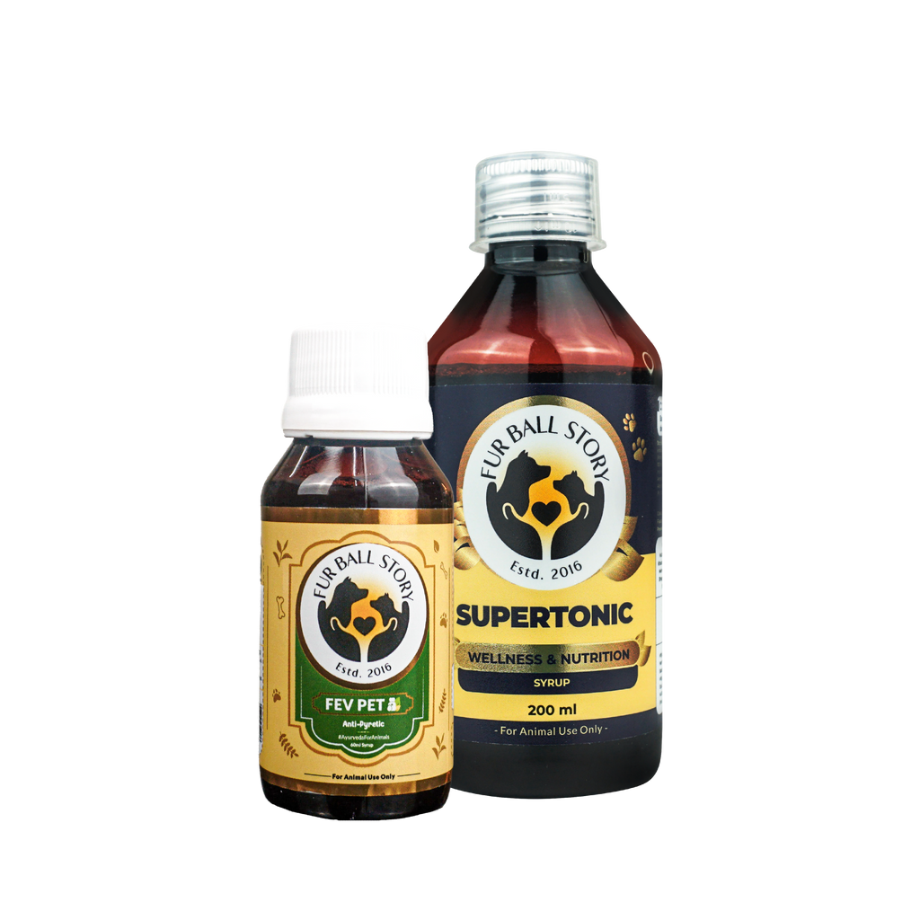 A product shot of Fur Ball Story's Fev Pet syrup bottle standing next to a larger bottle of Supertonic Wellness and Nutrition syrup.