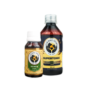 A product shot of Fur Ball Story's Fev Pet syrup bottle standing next to a larger bottle of Supertonic Wellness and Nutrition syrup.