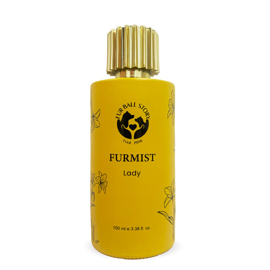 A sophisticated portrait of the Furmist Lady pet perfume. The vibrant mustard-yellow bottle is adorned with delicate black floral sketches and crowned with a fluted gold cap, presenting a luxury "spa-day" aesthetic for female dogs.
