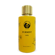 A sophisticated portrait of the Furmist Lady pet perfume. The vibrant mustard-yellow bottle is adorned with delicate black floral sketches and crowned with a fluted gold cap, presenting a luxury "spa-day" aesthetic for female dogs.