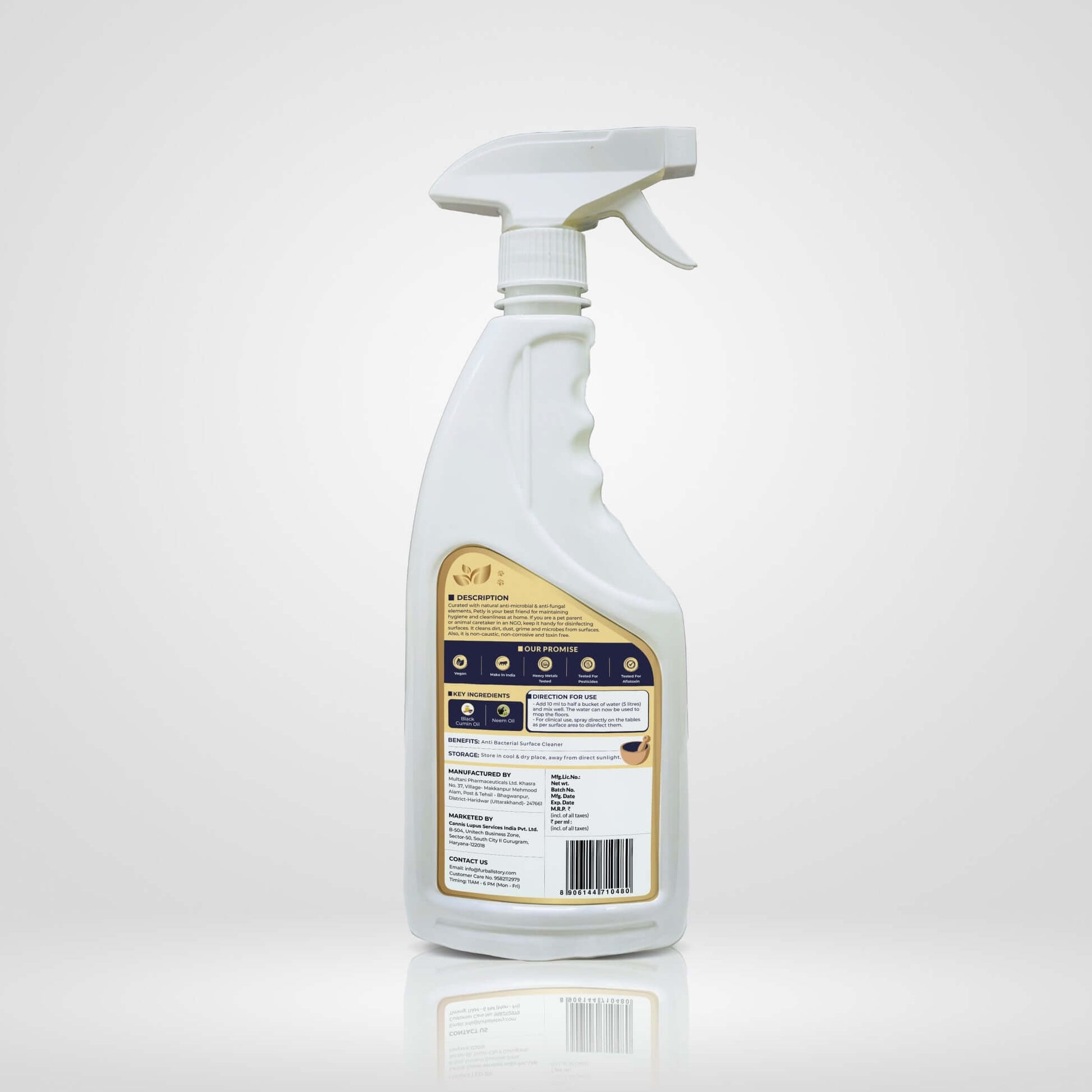 Rear view of the Petly spray bottle displaying product description, ingredients, and directions label.