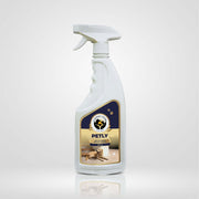 Front view of a white spray bottle of Petly Antibacterial Surface Cleaner featuring a dog on the label.